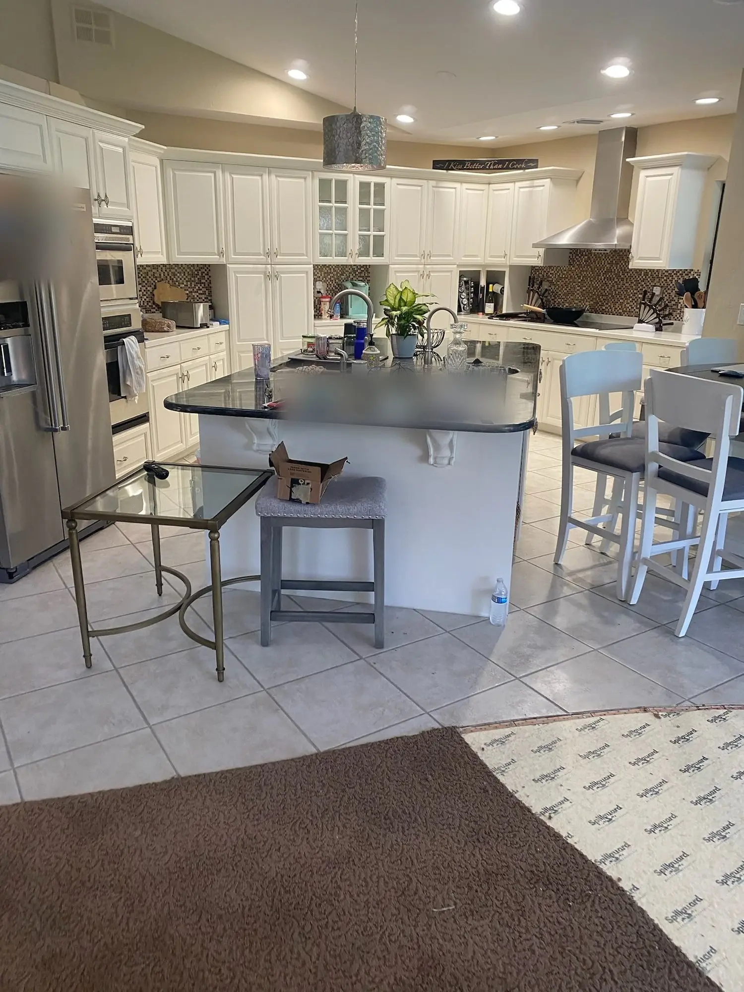 Before: Carpet and tile to vinyl plank