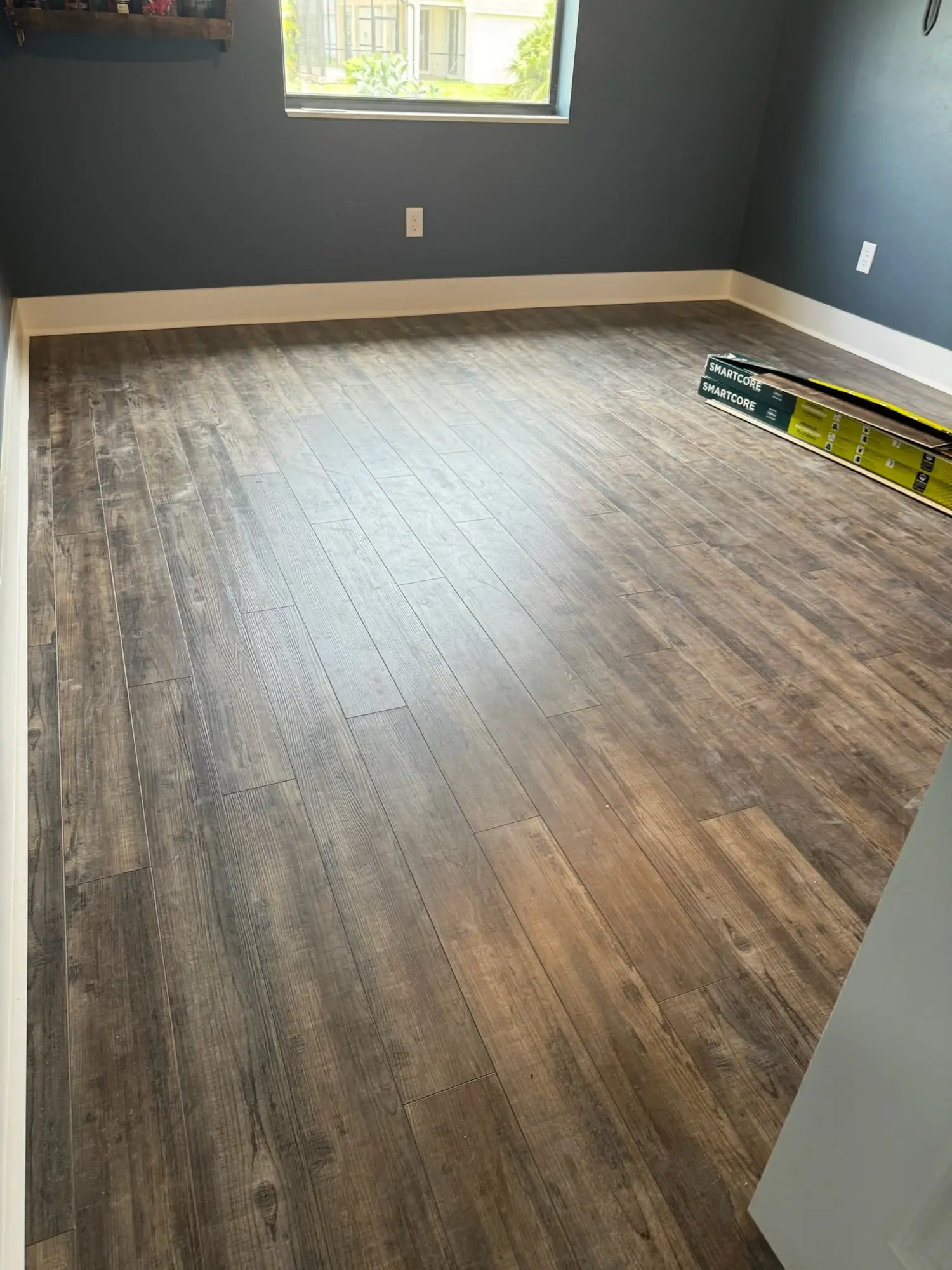 Bedroom refresh in laminate and rustic plank
