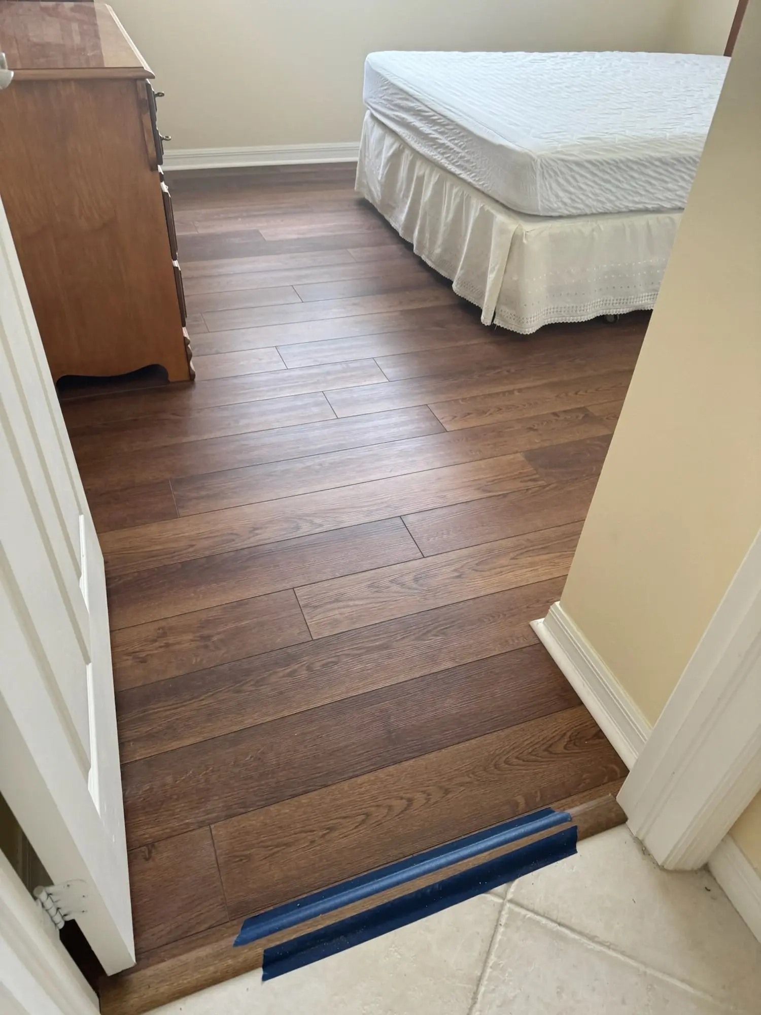 Bedroom refresh in laminate and rustic plank
