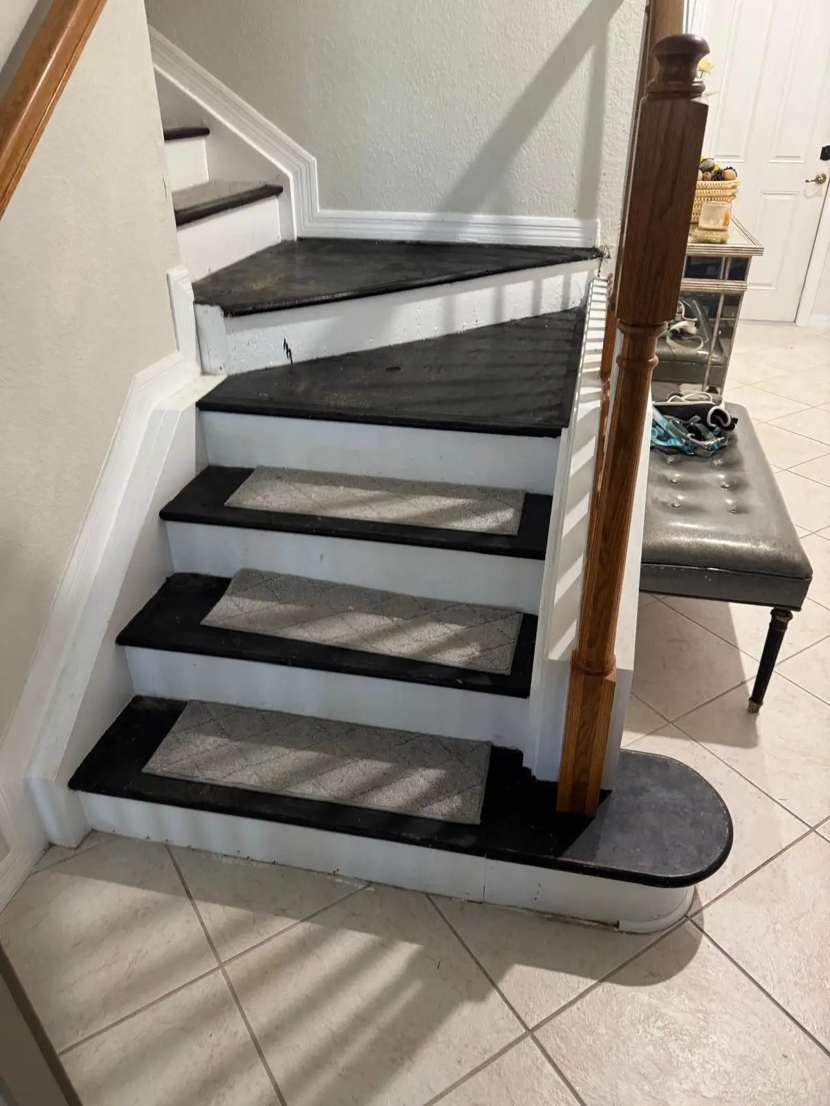 Before: Painted treads and carpet pads to vinyl plank