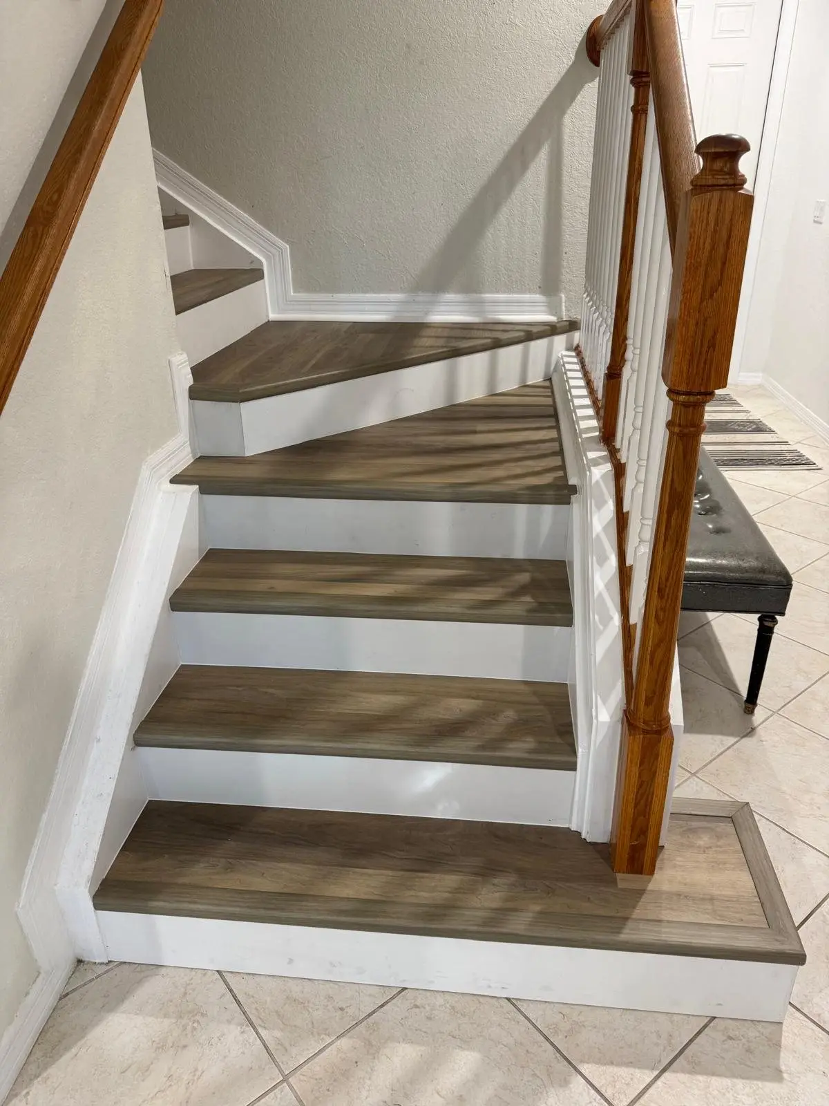 After: Painted treads and carpet pads to vinyl plank